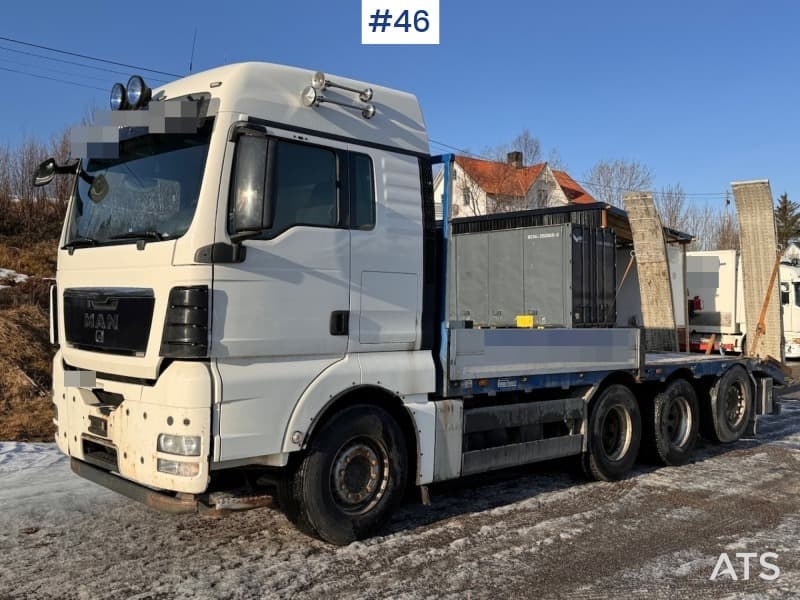 2012 MAN TGX 35.480 8x4 planbil m/ kjørebroer. 